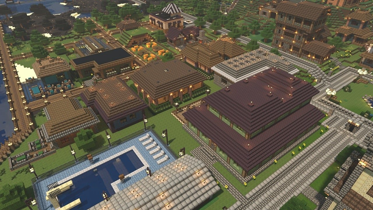 An aerial view of a large Minecraft town with many detailed buildings