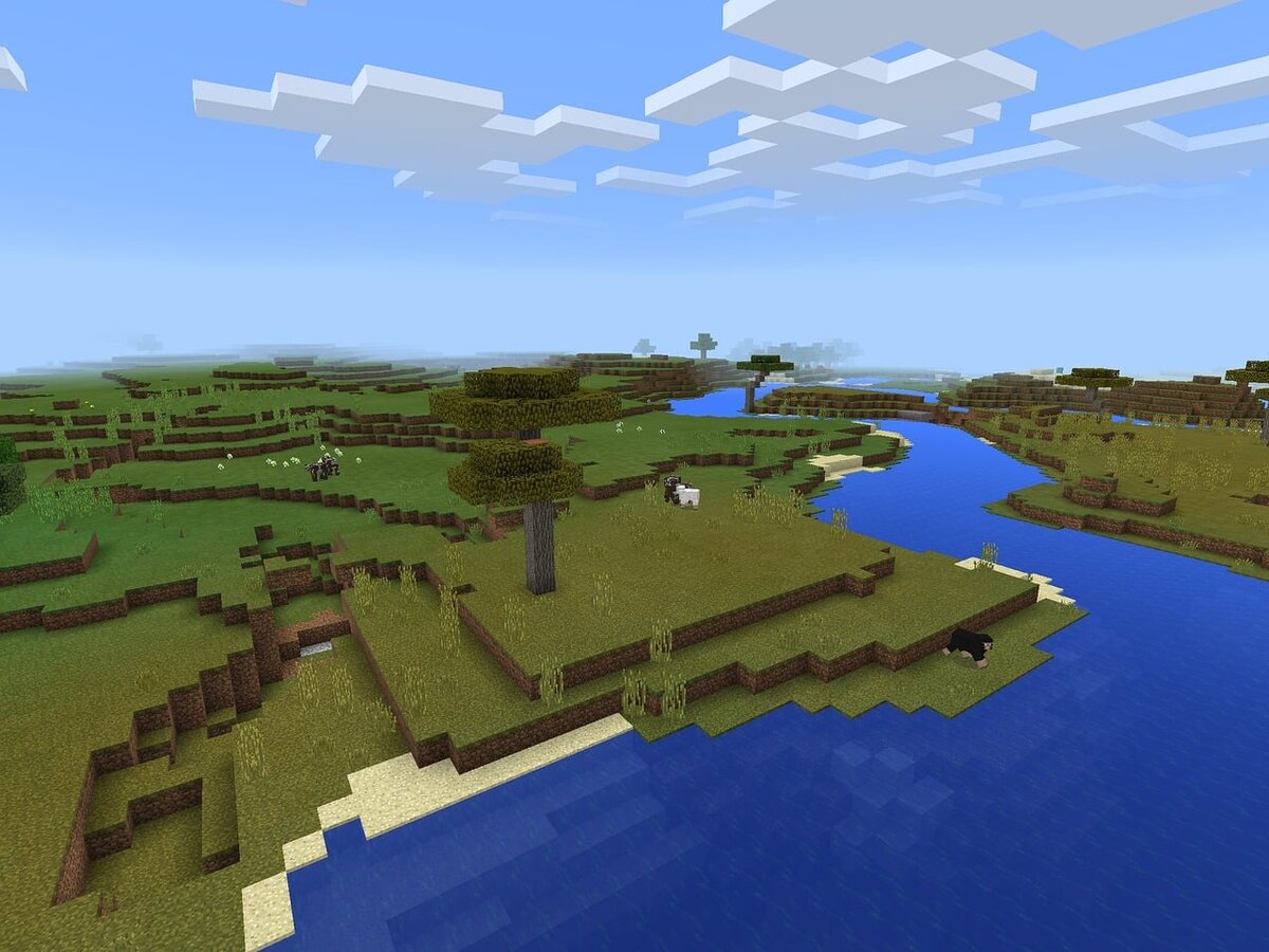 A wide river winding through grassy Minecraft hills
